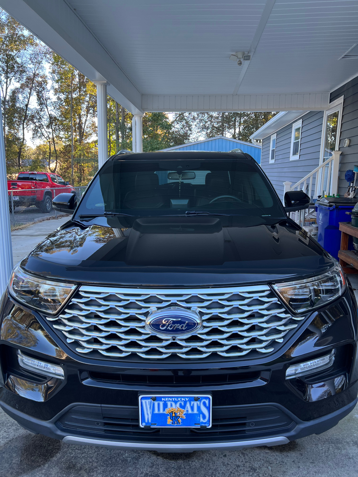 Glossy black Ford Explorer after a full exterior detail