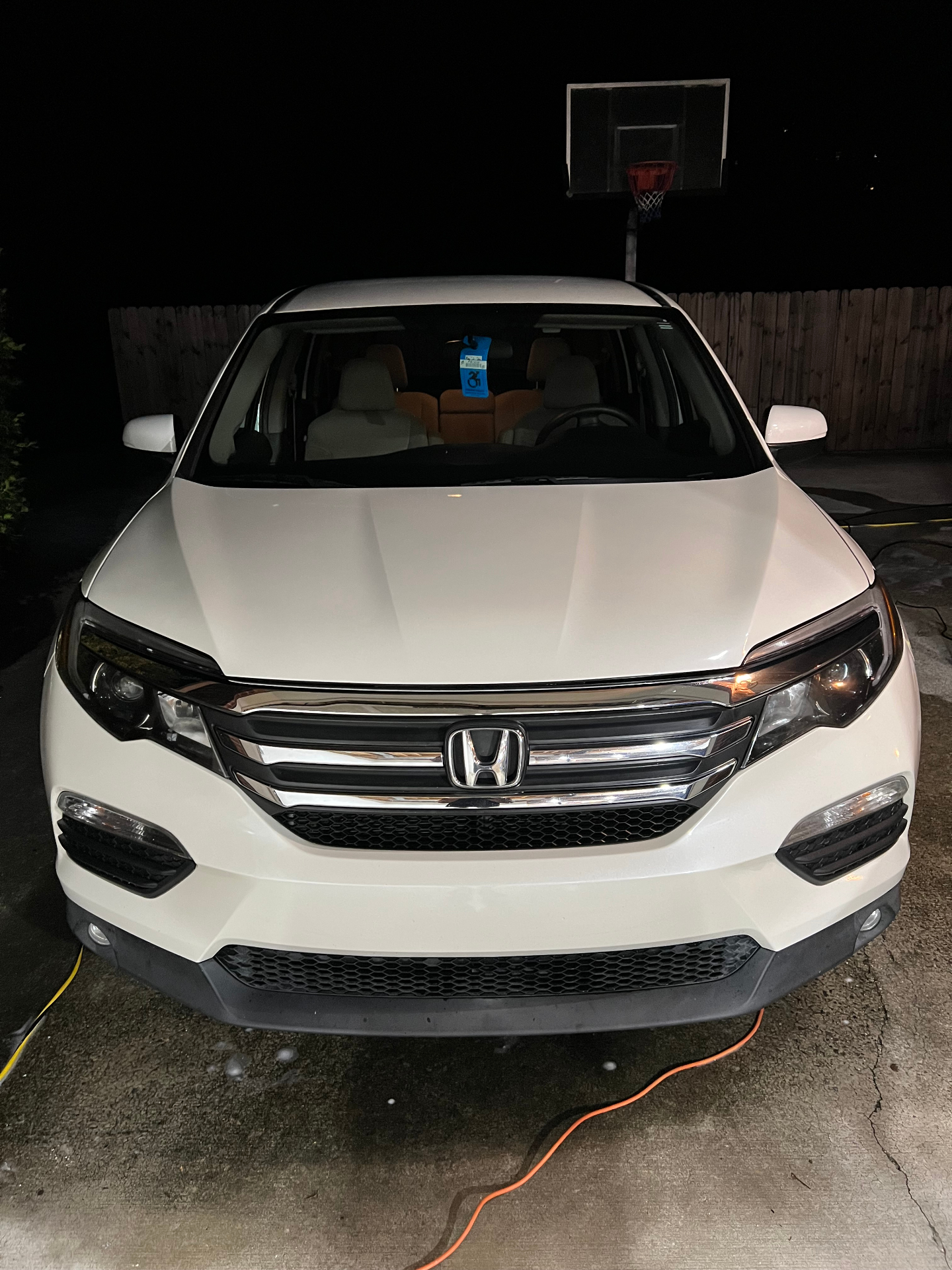 White Honda Pilot freshly washed and gleaming after a mobile detail